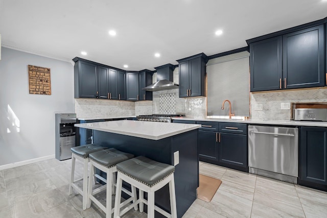 14-50 141st St, Whitestone, NY 11357 - kitchen featuring stainless steel dishwasher, wall chimney exhaust hood, a breakfast bar area, light countertops, and a sink