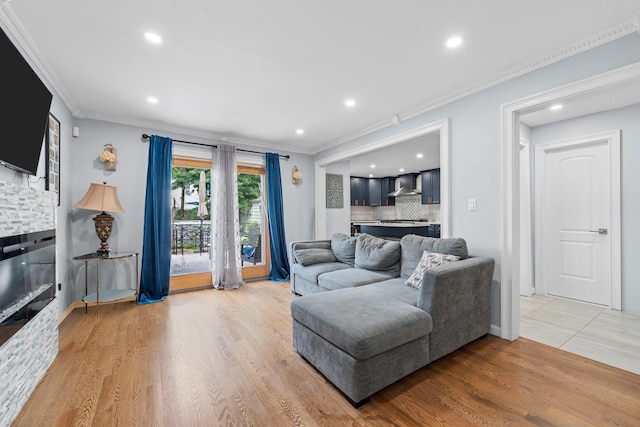 14-50 141st St, Whitestone, NY 11357 - living room with ornamental molding, light wood-style flooring, recessed lighting, and baseboards