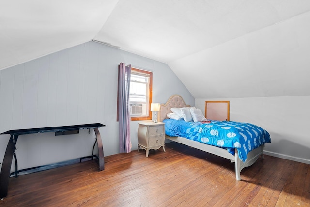14-50 141st St, Whitestone, NY 11357 - bedroom featuring wood-type flooring, vaulted ceiling, and cooling unit