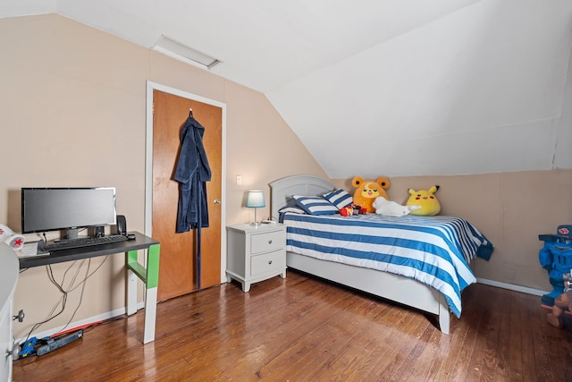 14-50 141st St, Whitestone, NY 11357 - bedroom with vaulted ceiling, wood finished floors, attic access, and baseboards
