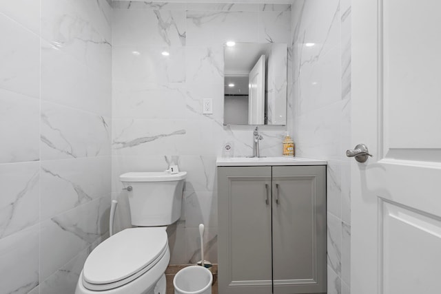 14-50 141st St, Whitestone, NY 11357 - bathroom with tile walls, vanity, and toilet