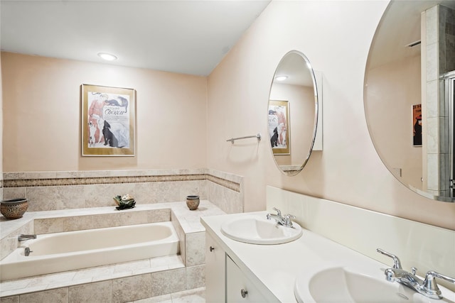 38 The Mews, Syosset, NY 11791 - full bathroom featuring a garden tub, double vanity, and recessed lighting