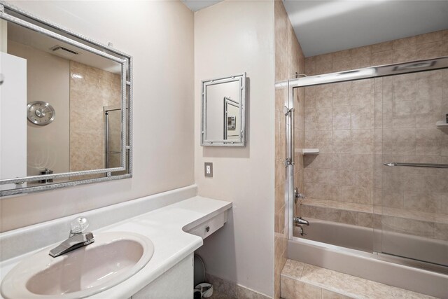38 The Mews, Syosset, NY 11791 - bathroom with bath / shower combo with glass door and vanity