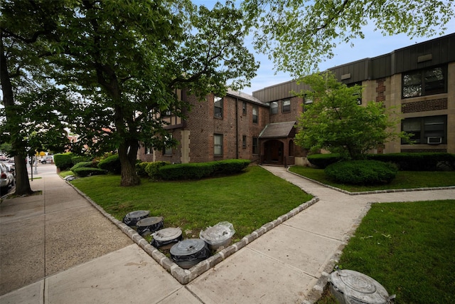 7607 Ditmars Blvd Unit 1, East Elmhurst, NY 11370 - view of community with a yard