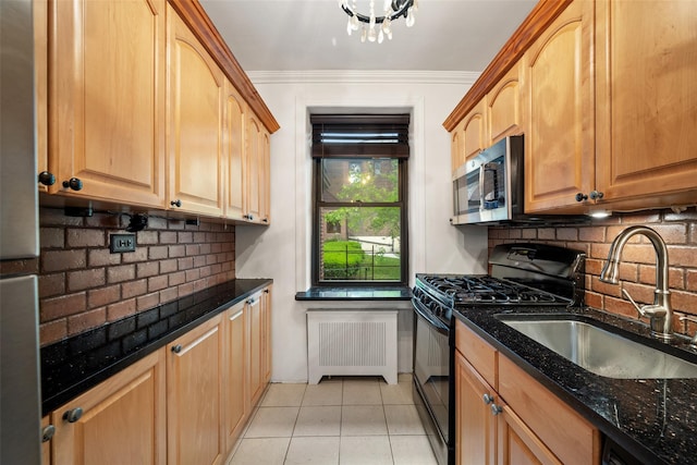 7607 Ditmars Blvd Unit 1, East Elmhurst, NY 11370 - kitchen featuring black appliances, a sink, tasteful backsplash, dark stone countertops, and crown molding