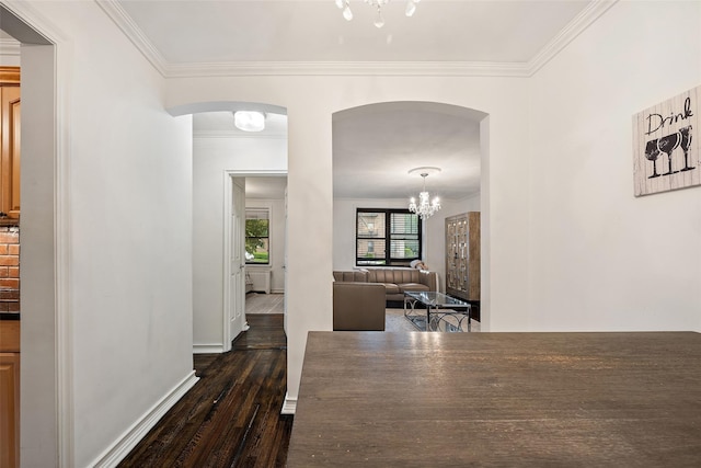 7607 Ditmars Blvd Unit 1, East Elmhurst, NY 11370 - dining space featuring arched walkways, dark wood-style floors, ornamental molding, a chandelier, and baseboards