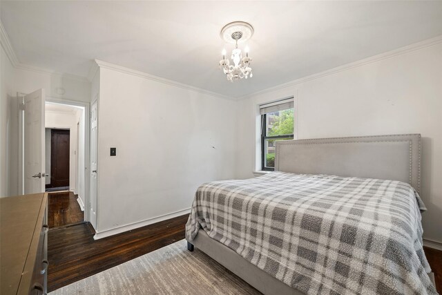 7607 Ditmars Blvd Unit 1, East Elmhurst, NY 11370 - bedroom with wood finished floors, ornamental molding, a chandelier, and baseboards