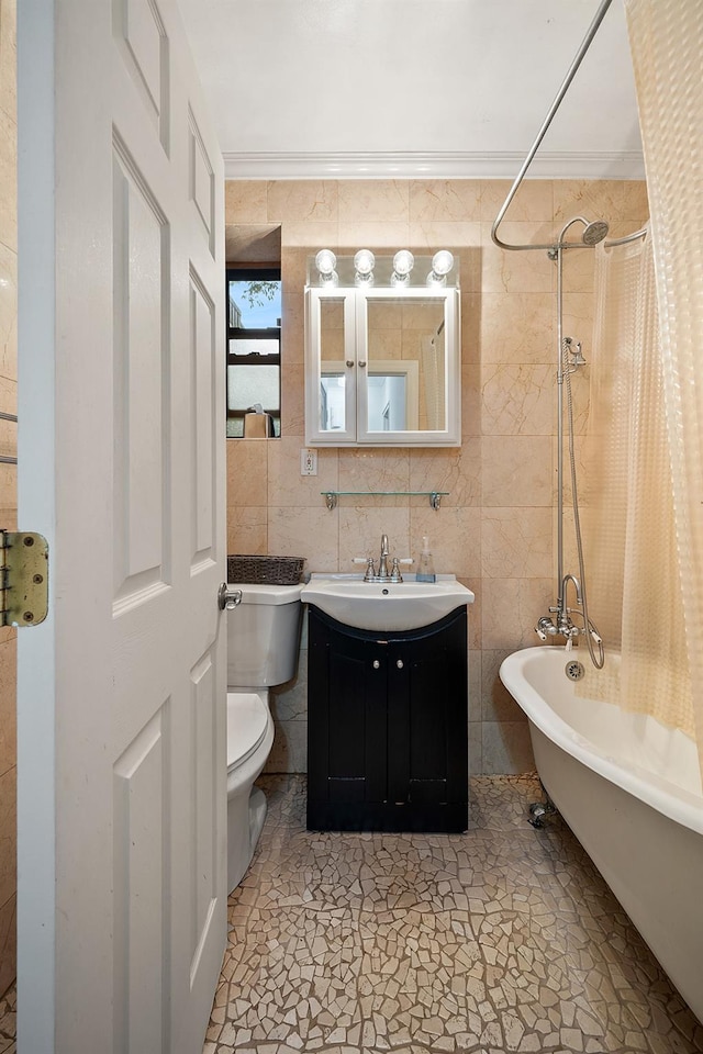 7607 Ditmars Blvd Unit 1, East Elmhurst, NY 11370 - bathroom with tile walls, vanity, toilet, and shower / tub combo