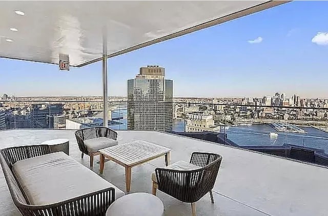 75 Wall St Unit 26J, New York Manhattan, NY 10005 - view of patio / terrace with a balcony and a city view