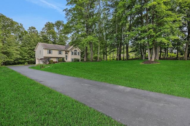 390 Lakeside Rd, Newburgh, NY 12550 - view of front of home with driveway, a front lawn, and an attached garage
