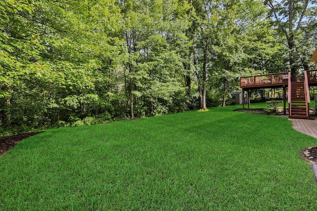 390 Lakeside Rd, Newburgh, NY 12550 - view of grassy yard featuring stairs and a deck