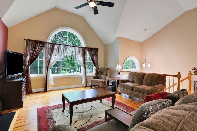 390 Lakeside Rd, Newburgh, NY 12550 - living area featuring a ceiling fan, light wood-style floors, high vaulted ceiling, and baseboards