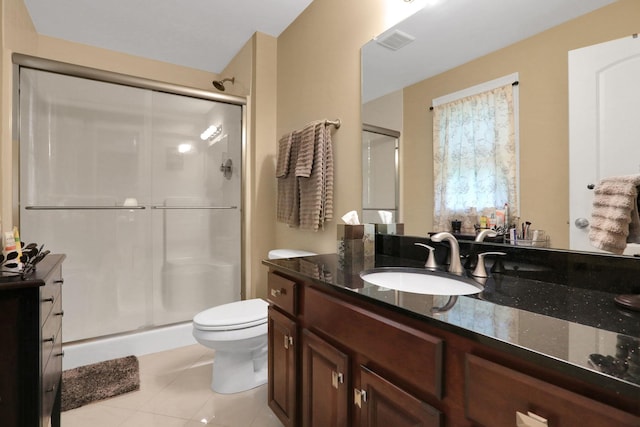 390 Lakeside Rd, Newburgh, NY 12550 - full bathroom with tile patterned floors, vanity, a shower stall, and toilet