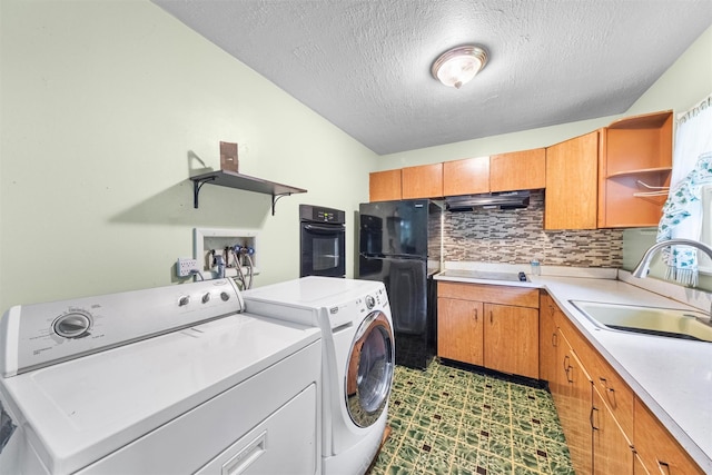 218 Johnson Rd, Wingdale, NY 12594 - washroom with washer and dryer, a textured ceiling, and dark flooring