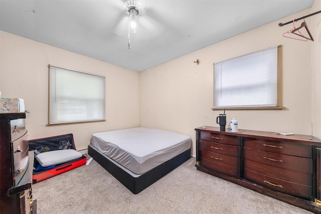 218 Johnson Rd, Wingdale, NY 12594 - bedroom with light colored carpet, baseboard heating, and a ceiling fan