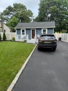 84 Oxhead Rd, Centereach, NY 11720 - view of front of property featuring driveway