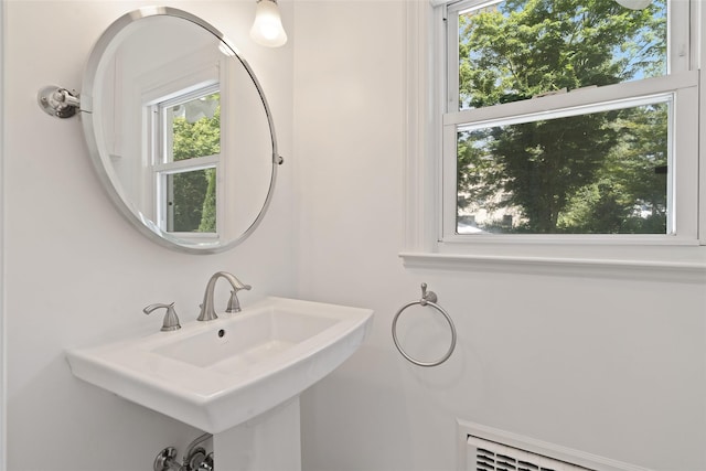 61 Tamarack Rd, Rye Brook, NY 10573 - bathroom with healthy amount of natural light and a sink