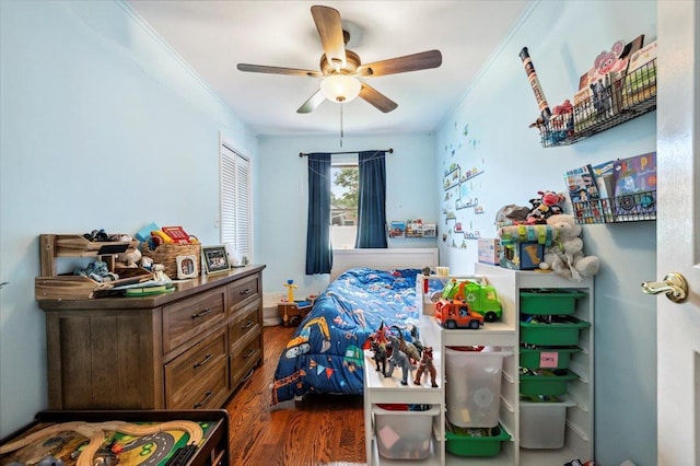 3363 Emeric Ave, Wantagh, NY 11793 - bedroom with dark wood-style flooring, crown molding, and a ceiling fan