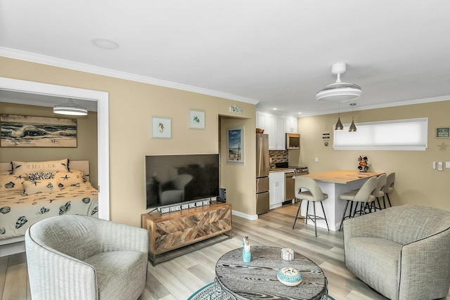 281 Dune Rd Unit 18A, Westhampton Beach, NY 11978 - living area with light wood-style floors and crown molding
