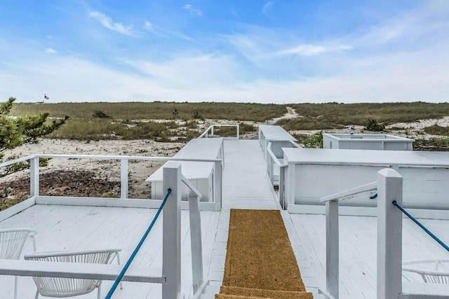 281 Dune Rd Unit 18A, Westhampton Beach, NY 11978 - view of yard featuring a balcony and a view of countryside