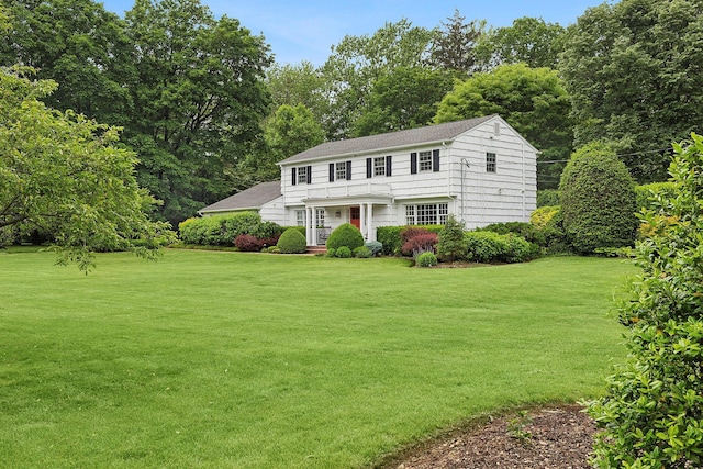 2 Shady Meadow Ln, Syosset, NY 11791 - view of front of property with a front yard