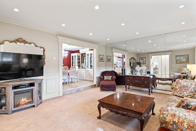 6 W Shore Rd, Bay Shore, NY 11706 - living area featuring a decorative wall, ornamental molding, light colored carpet, a wall mounted AC, and a wainscoted wall