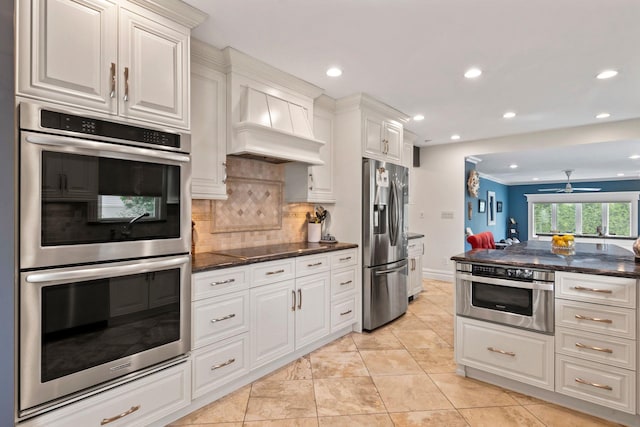 6 W Shore Rd, Bay Shore, NY 11706 - kitchen with stainless steel appliances, a ceiling fan, custom range hood, tasteful backsplash, and recessed lighting