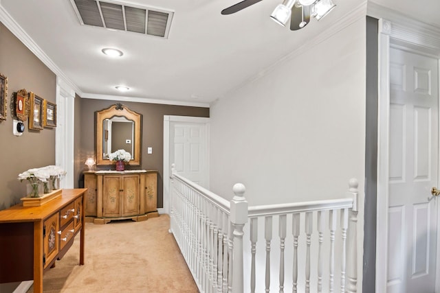 6 W Shore Rd, Bay Shore, NY 11706 - hallway with an upstairs landing, light colored carpet, and crown molding