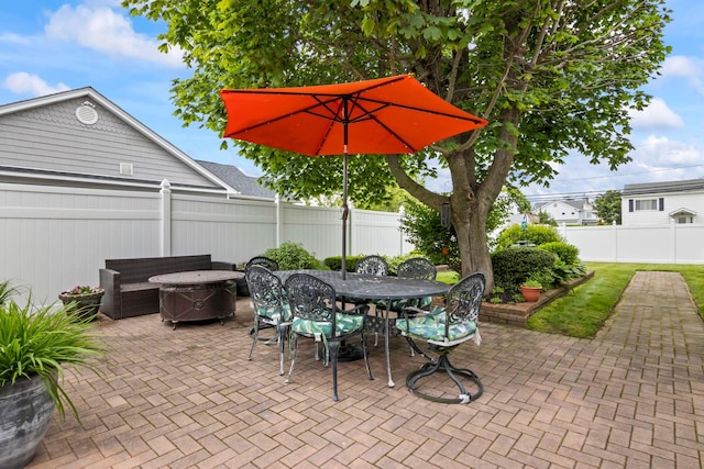6 W Shore Rd, Bay Shore, NY 11706 - fenced backyard with a patio and outdoor dining area