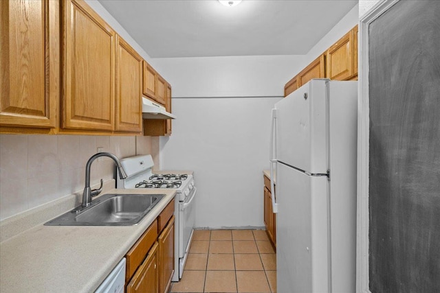 20 William St Unit 3D, Mount Vernon, NY 10552 - kitchen featuring white appliances, a sink, light countertops, backsplash, and under cabinet range hood