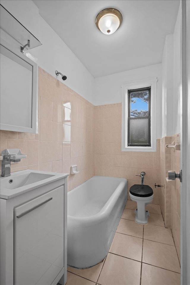 20 William St Unit 3D, Mount Vernon, NY 10552 - bathroom featuring tile walls, vanity, tile patterned flooring, and toilet