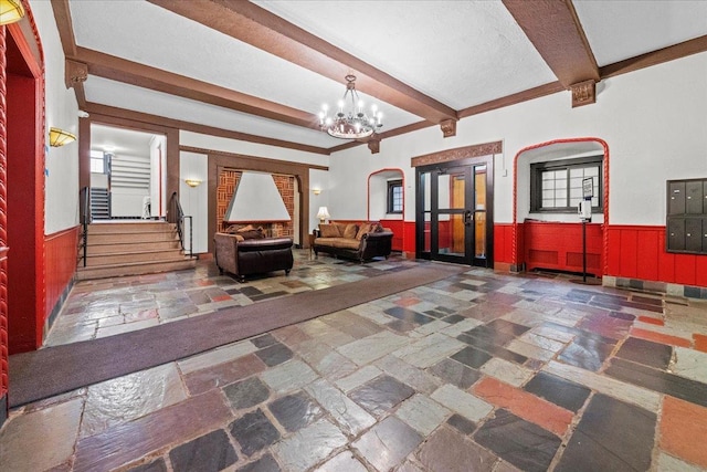 20 William St Unit 3D, Mount Vernon, NY 10552 - lobby featuring beamed ceiling, a wainscoted wall, and stairs