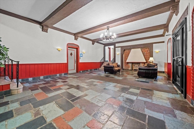 20 William St Unit 3D, Mount Vernon, NY 10552 - interior space featuring a fireplace and a wainscoted wall