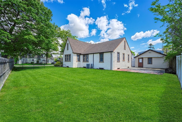 240 Tyrconnell Ave, Massapequa Park, NY 11762 - rear view of property featuring central air condition unit, a patio area, a shingled roof, and brick siding