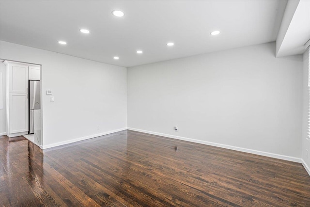 855 Winter Ave, Uniondale, NY 11553 - unfurnished room with recessed lighting, dark wood-style flooring, and baseboards