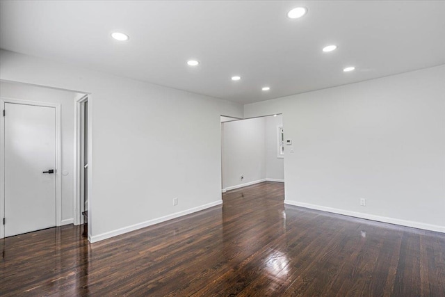 855 Winter Ave, Uniondale, NY 11553 - empty room featuring wood finished floors, recessed lighting, and baseboards
