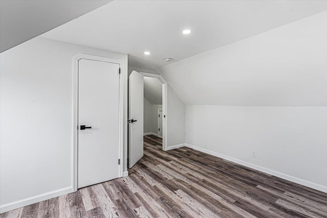 855 Winter Ave, Uniondale, NY 11553 - bonus room featuring wood finished floors, recessed lighting, lofted ceiling, and baseboards