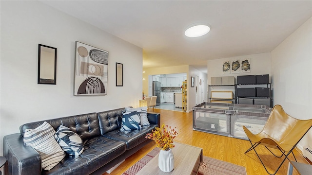 37-40 61st St, Woodside, NY 11377 - living room featuring wood finished floors