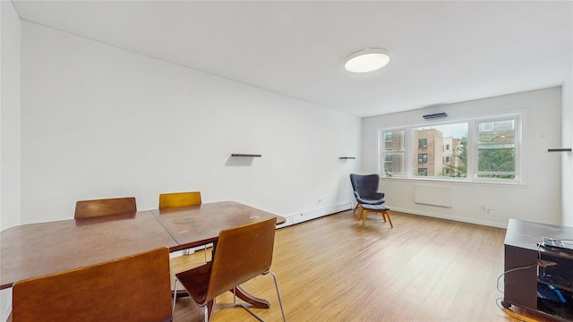 37-40 61st St, Woodside, NY 11377 - office featuring baseboard heating and light wood-style flooring