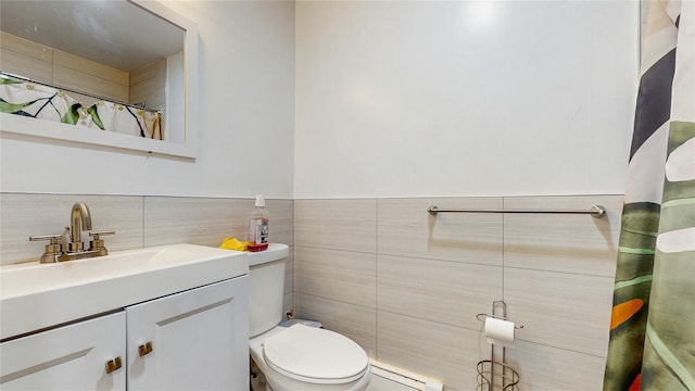 37-40 61st St, Woodside, NY 11377 - bathroom with tile walls, vanity, baseboard heating, and a shower with curtain