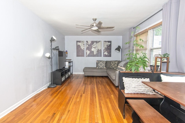 251-10 71st Rd Unit 30A, Bellerose, NY 11426 - living room with wood finished floors, ceiling fan, and baseboards