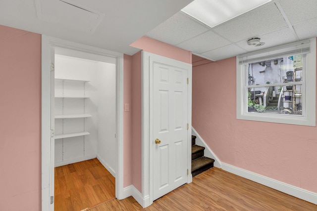 5 E Walnut St, Long Beach, NY 11561 - basement with light wood-style floors, baseboards, and stairs