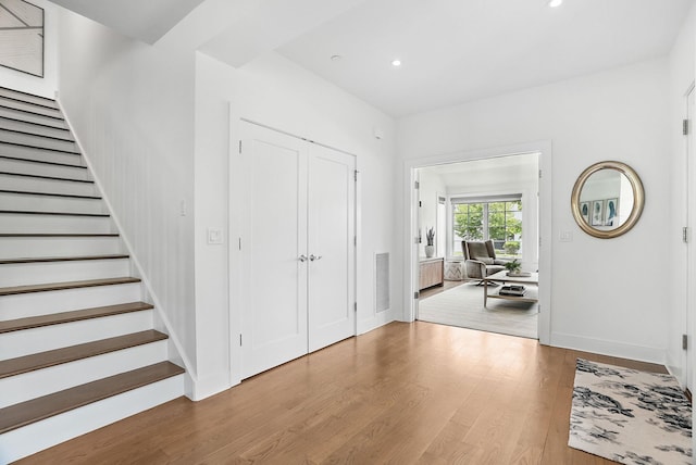 27 Lavender Ln, Rye Brook, NY 10573 - entryway with stairway, wood finished floors, and recessed lighting