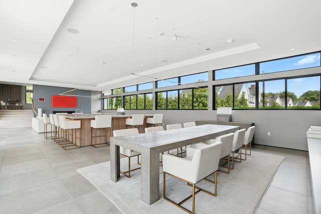 27 Lavender Ln, Rye Brook, NY 10573 - dining room featuring a raised ceiling and light tile patterned floors