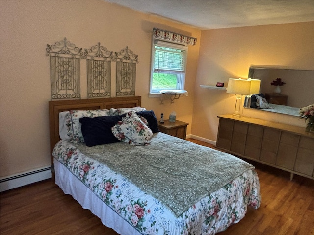 6 Windmill Rd, Poughkeepsie, NY 12601 - bedroom featuring wood finished floors, baseboard heating, and baseboards