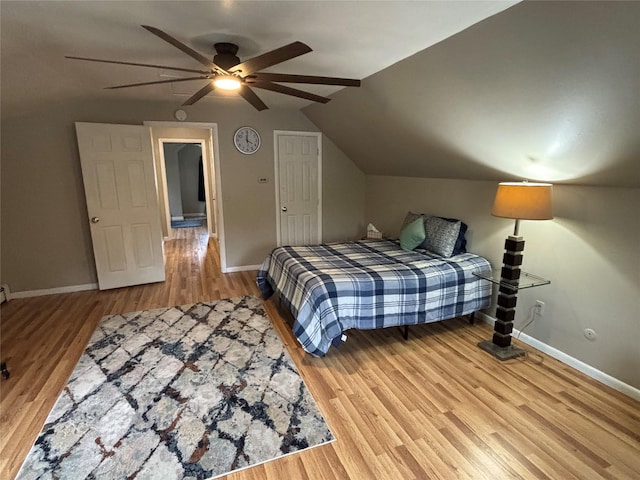 6 Windmill Rd, Poughkeepsie, NY 12601 - bedroom with baseboards, lofted ceiling, wood finished floors, and a ceiling fan