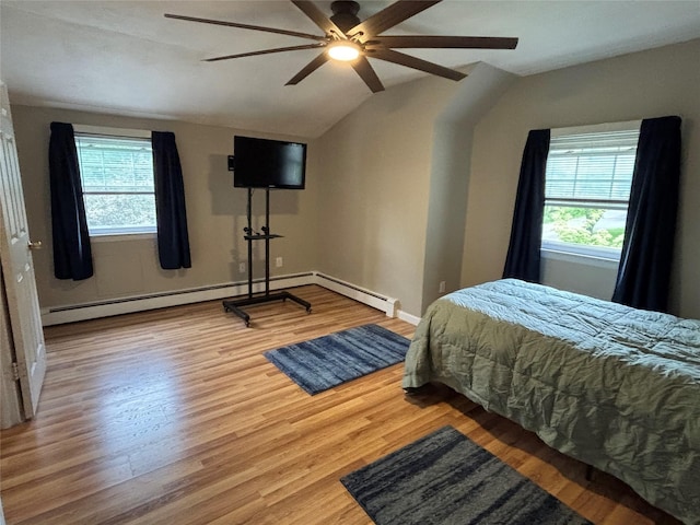6 Windmill Rd, Poughkeepsie, NY 12601 - bedroom with wood finished floors, lofted ceiling, a baseboard radiator, a ceiling fan, and baseboards