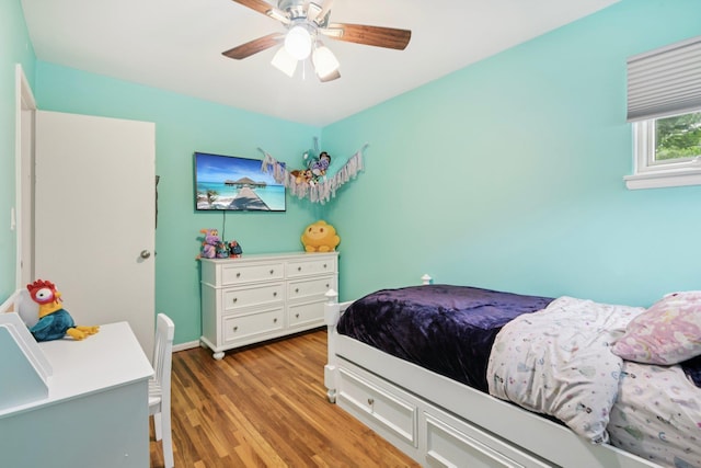 422 Old Bridge Rd, Northport, NY 11768 - bedroom featuring light wood-style flooring, ceiling fan, and baseboards