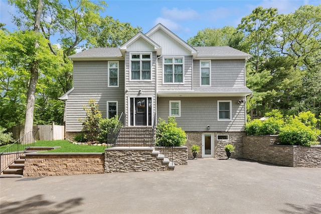 79 Oakside Rd, Smithtown, NY 11787 - view of front of property featuring a patio area and roof with shingles