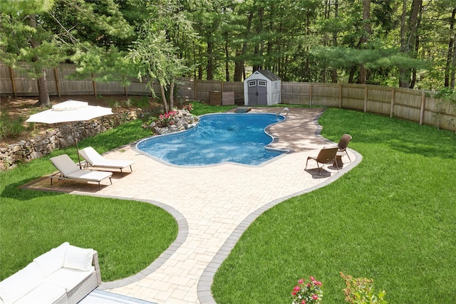 79 Oakside Rd, Smithtown, NY 11787 - view of swimming pool with a patio area, a fenced backyard, and a storage unit